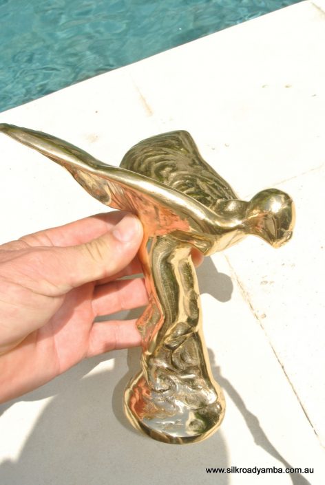 POLISHED BRASS CAR emblem over size MASCOT Replica of ROLLS ROYCE FLYING LADY EMBLEM. Same shape as from the famous car but larger hand made from brass Spirit of Ecstasy Old style. Very nice item. Heavy. Antique looking. 7 inches high Size 190mm high x 175mm x 140mm approx base 75mm across