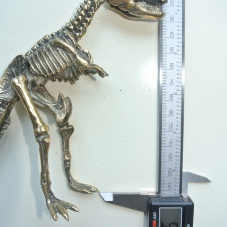 brass dinosaur figurine